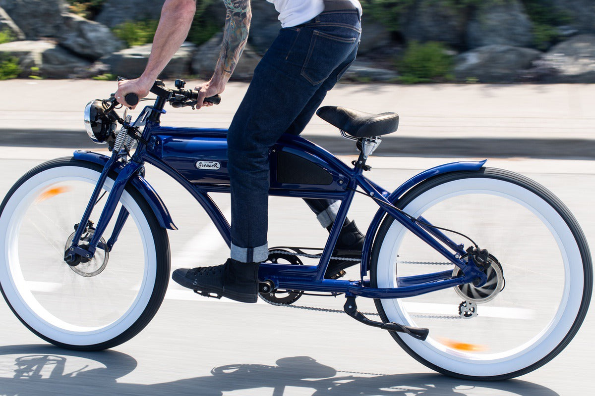 Man using pedal assist system on eBike while exercising outdoors