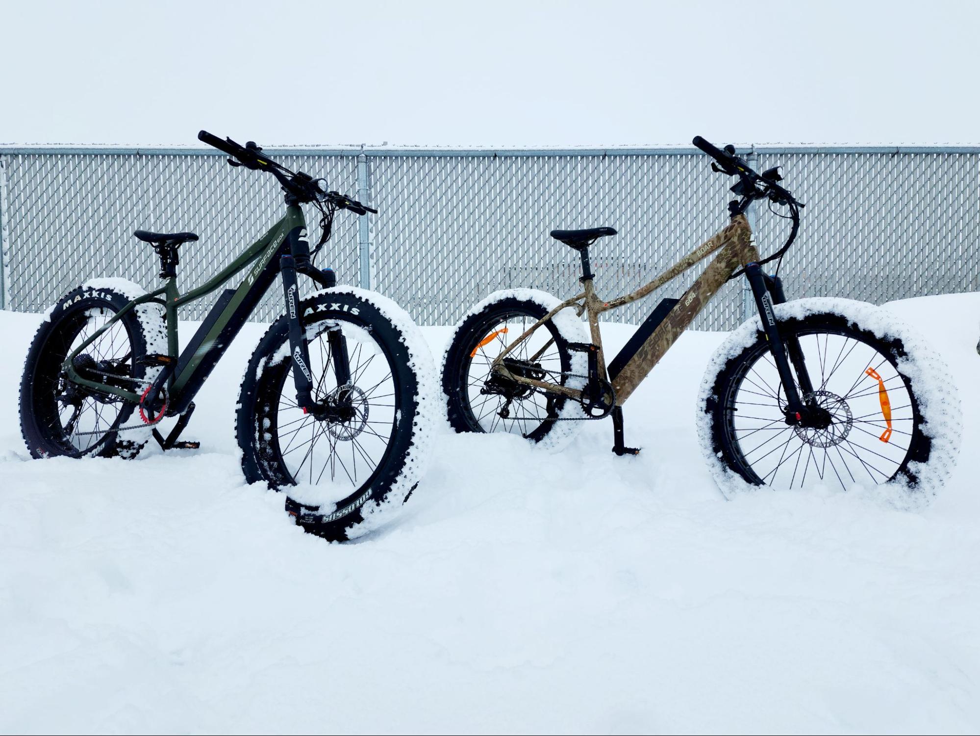 Surface604 eBikes parked in snowy winter weather
